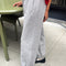 side view of model wearing heather grey jogger sweatpants