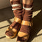 model wearing brown socks with two white stripe cuff