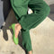 model wearing moss green pointelle balloon pants
