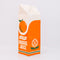 side view of ceramic orange juice carton-shaped vase