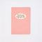 red and cream vertical stripe with cream circle with 'growing imperfectly' inside