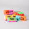 up close of set of 6 colorful erasers in a tin container with a window in the front