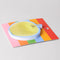 side view of green apple shaped sticky notepad
