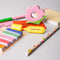 up close of reading kit with 5 sticky flags (75 sheets each), mini highlighter, sticky notepad (75 sheets), book holder, bookmark, pencil, pen
