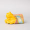 french fry shaped de-stress ball laying on it's side