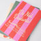 Set of three colorful pocket notebooks