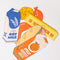 oat milk, butter stick, cheese wedge, sausage link and orange juice carton bookmarks