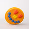 smiling pancake de stress ball with cute face design
