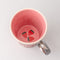 strawberries on bottom of strawberry ice cream mug