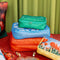 4 packing cubes with various sayings and realistic prints