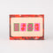 Back view of set of 2 cherry print playing card decks