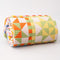 rolled up colorful patchwork print quilted blanket with light green trim