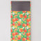 Back view of magnetic shopping list notepad with colorful fruit illustration