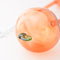 up close of set of 2 glass peach watering globes