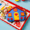 blue house bag charm with red and yellow trim