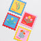 set of 4 colorful floral theme postage stamp shaped coasters