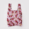 pink baby baggu with minnie in her classic red heart dress