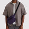 model wearing fig (deep purple) fanny pack