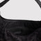 interior of charcoal shoulder bag with black ditsy floral