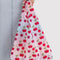 model holding gradient baggu with cherry print