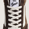 up close of two toned brown super low pro sneaker