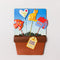 packaged set of 4 metal plant stakes: folk red bird, folk floral heart, yellow cat, and blue and red house