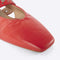 up close of cherry red slingback flat with large grommet buckle and square toe