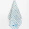 hanging white tea towel with blue fruit grid and snoopy eating cherries print