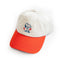 cream dad hat with red bill and embroidered snoopy and strawberry print