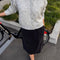 model wearing grey mohair button up cardigan