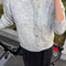 model wearing grey mohair button up cardigan