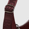 up close of silver buckle on adjustable strap