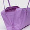 side view of rose rectangular nylon bowler bag with matching zipper and charm clasp