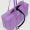 black interior key leash of rose rectangular nylon bowler bag with matching zipper and charm clasp