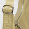 up close of handle and silver buckle of straw leather crescent bag