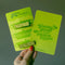 model holding set of two green 'pyrex inspired' hair clips