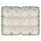 top view of stoneware egg holder with sage trim and pretty burgundy floral print