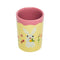 top view of pale yellow and mauve juice glass with bunny and floral print