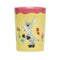 front view of pale yellow and mauve juice glass with donkey and floral print