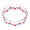 top view of glass storage bowl with white lid and red and blue flower design