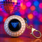 disco decision key ring on a table