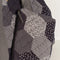 up close of blue, black and grey quilted patchwork pouch