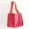pink quilted floral tote bag with yellow printed interior