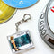 back of hilary duff mini CD keychain