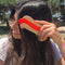 model using hot dog shaped pocket comb