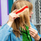 model using hot dog shaped pocket comb