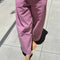 model wearing dusty lilac cotton relaxed pants