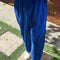 model wearing cobalt blue corduroy arc pants