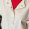 up close of model wearing naturel snap front cotton cardigan