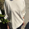 model wearing naturel cotton long sleeve tunic with mockneck